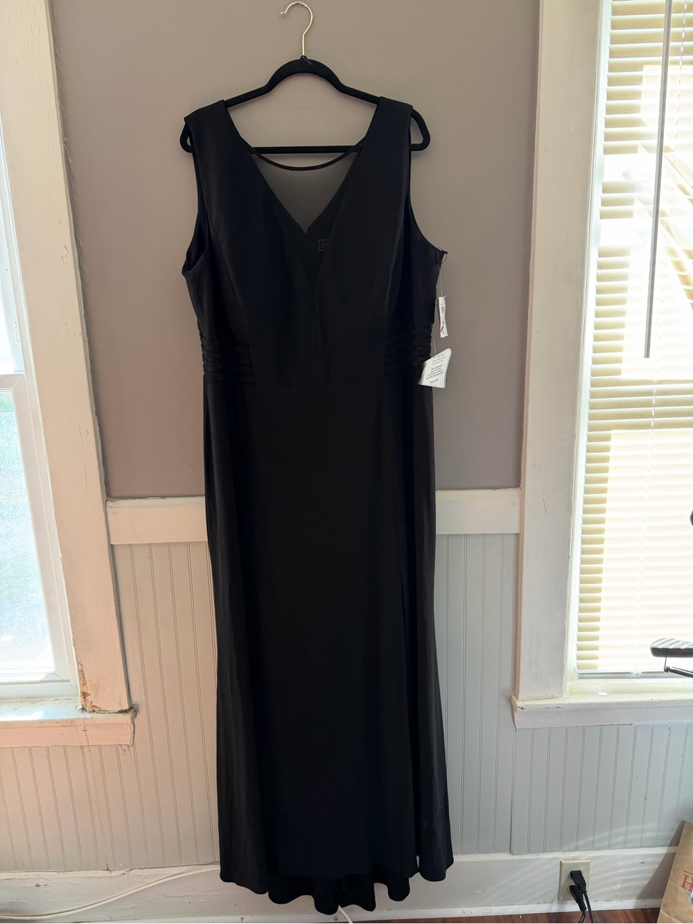 New with tags R & M Richard’s black gown